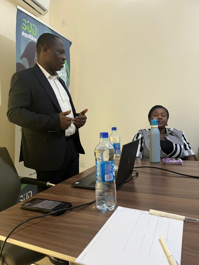 A partner leading a finance training session for a client team